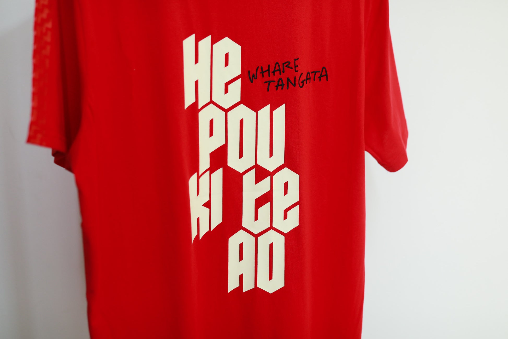 WHARE TANGATA TEE RED