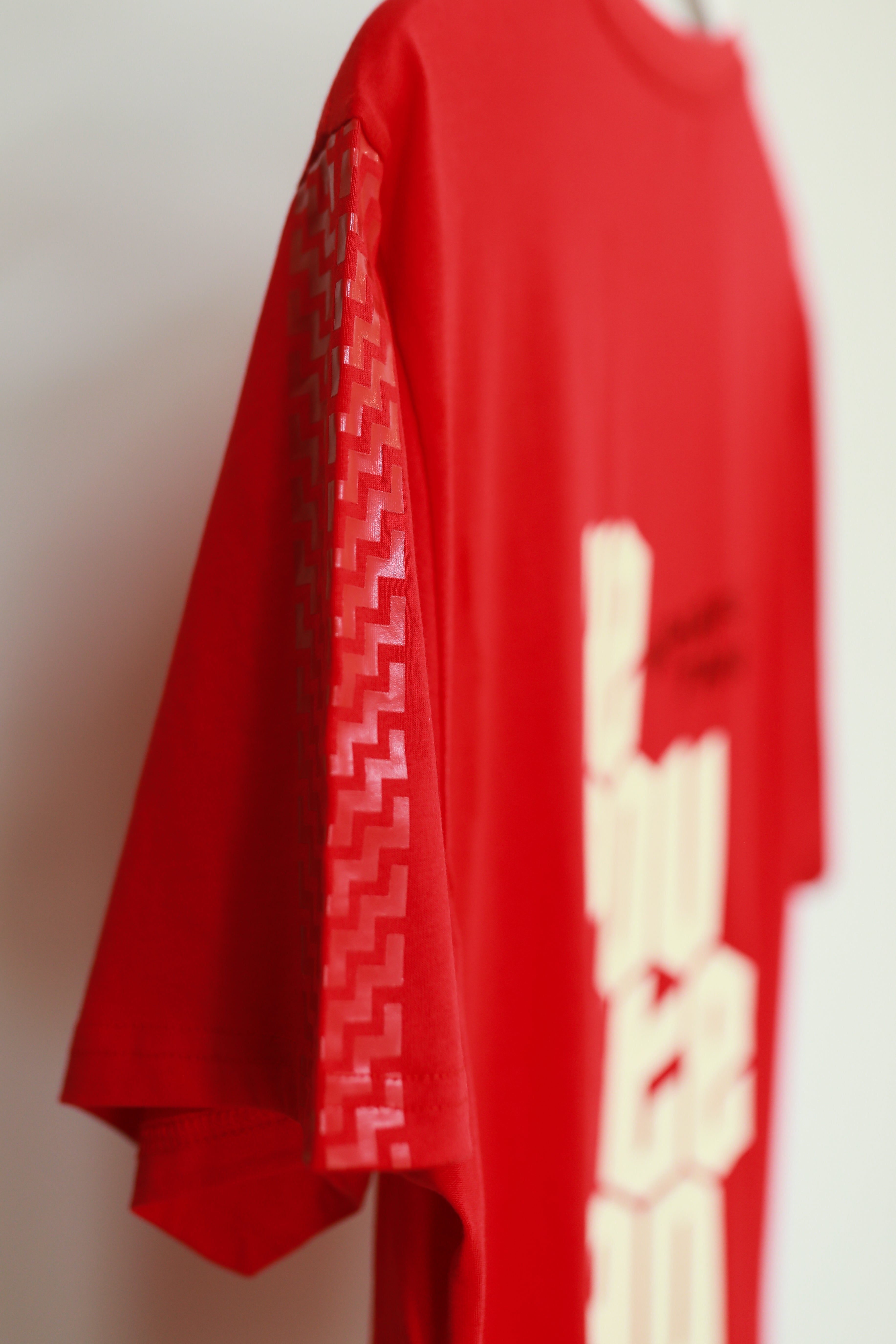 WHARE TANGATA TEE RED